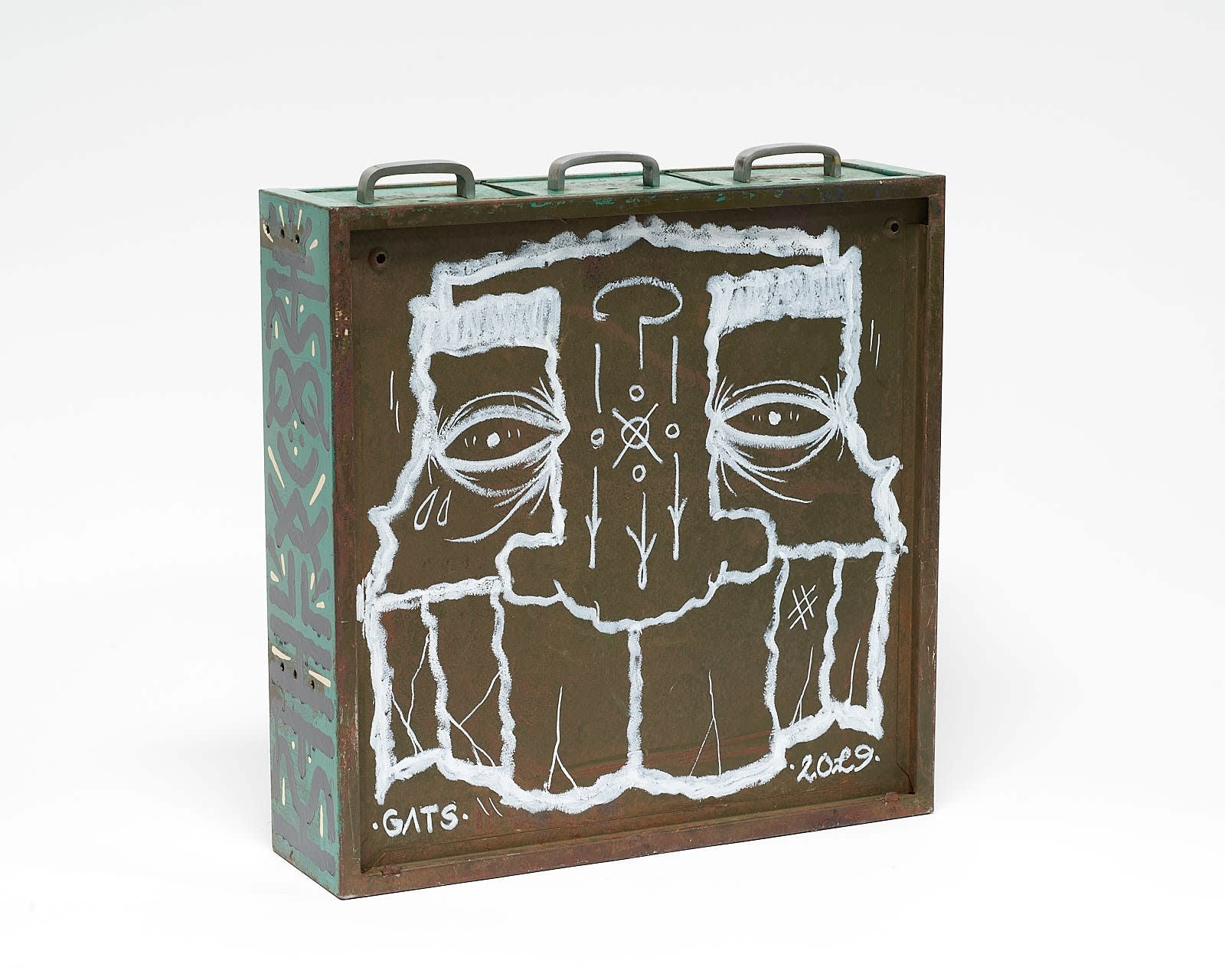 vintage filing cabinet adorned with designs of a geometric figured