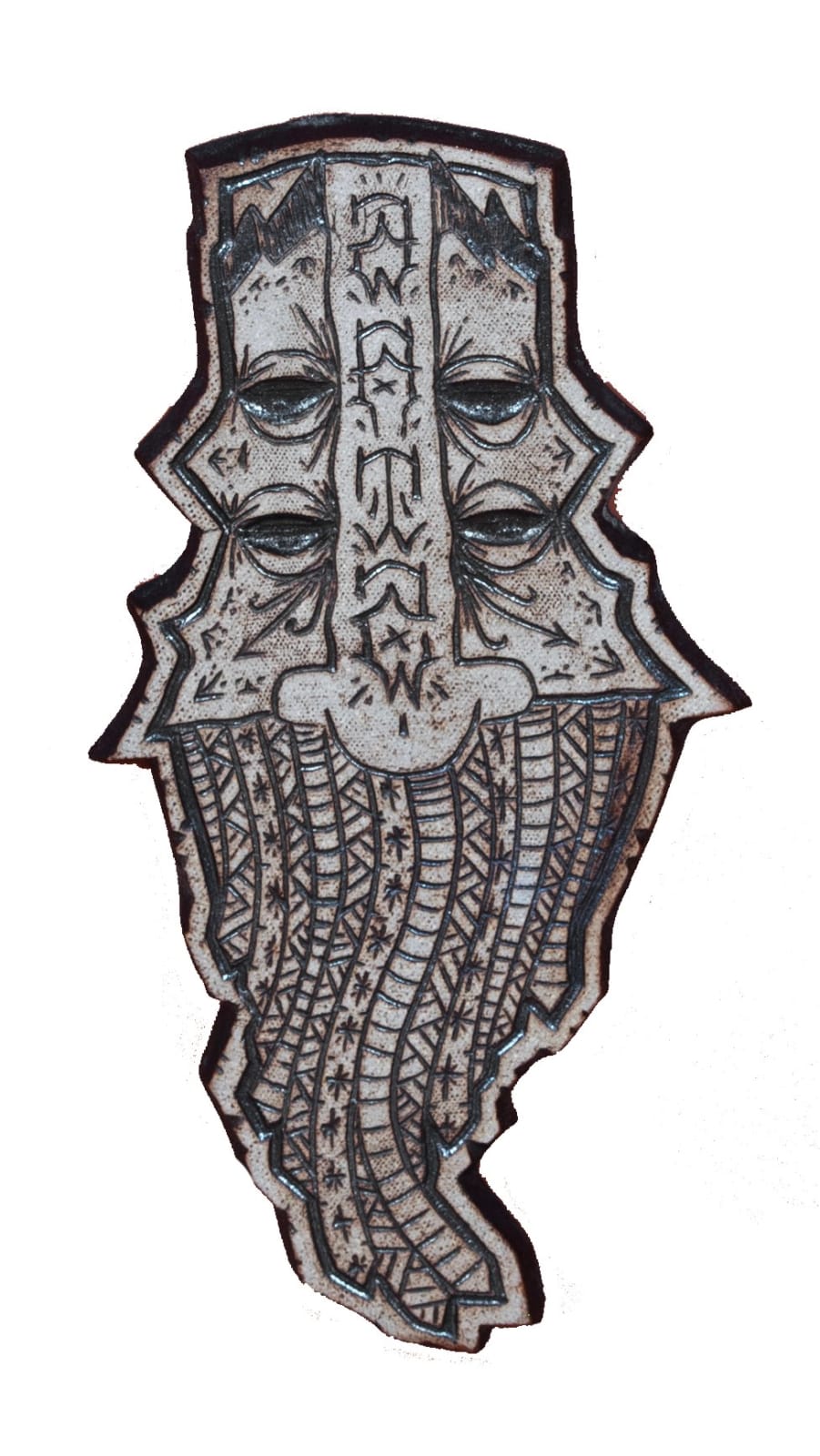 gray sculptural mask of a four eyed figure with a beard