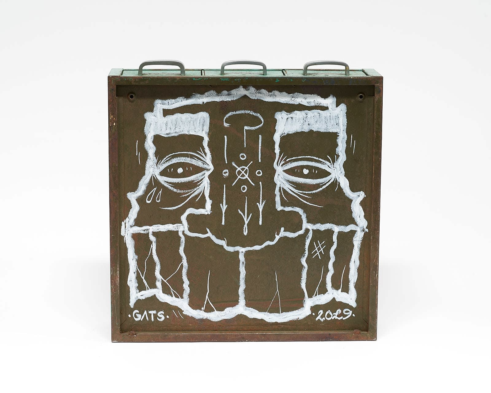 vintage filing cabinet adorned with designs of a geometric figured