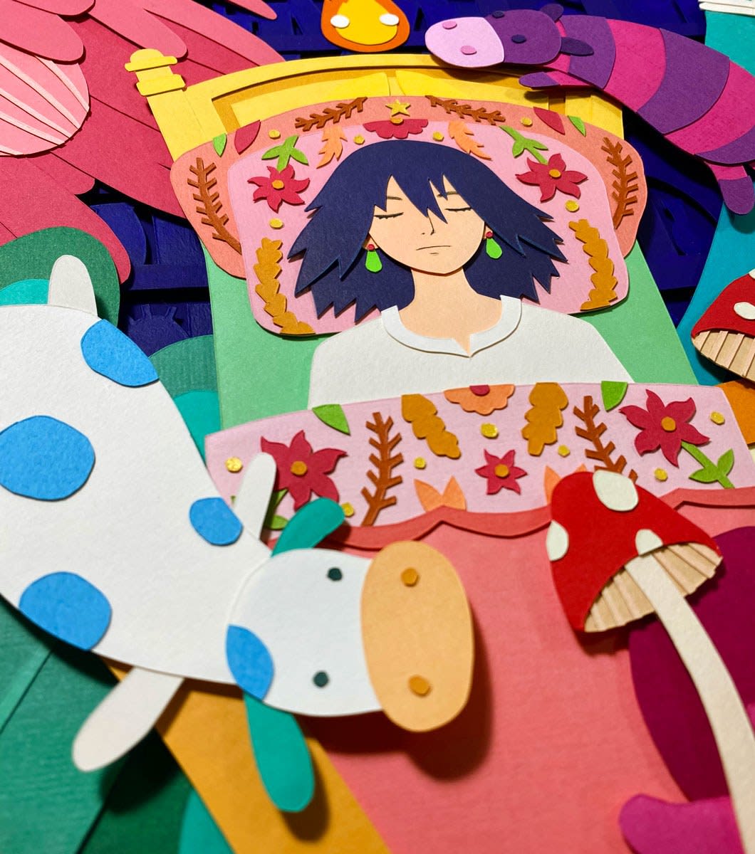 Howl sleeping surroinded by a colorful background of plants, animals, and patterns