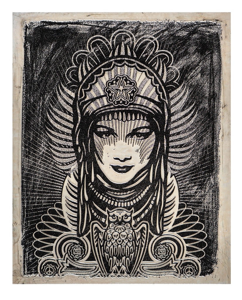 image of a woman in grey scale with a head piece on