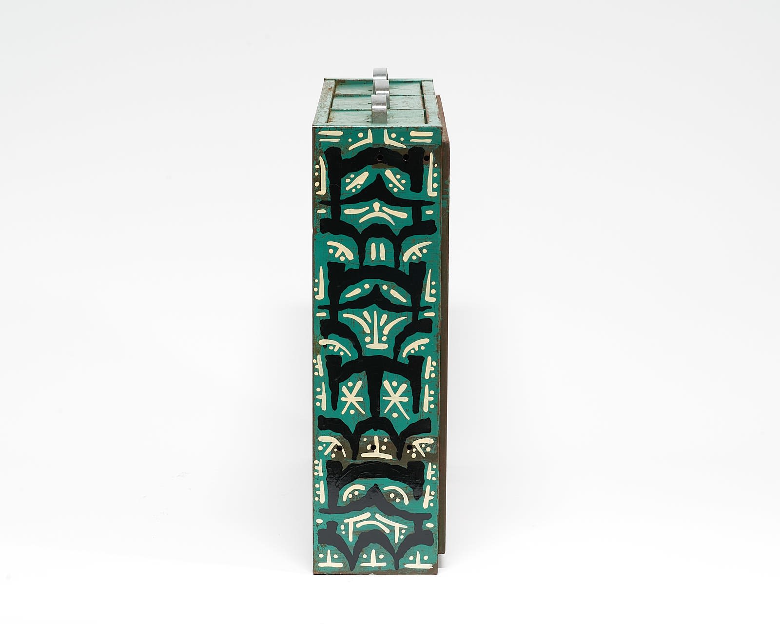 vintage filing cabinet adorned with designs of a geometric figured