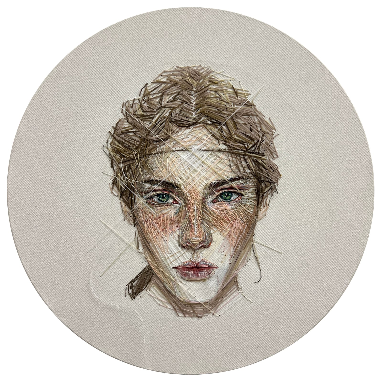 embroidered portrait of a woman by Rose Couch