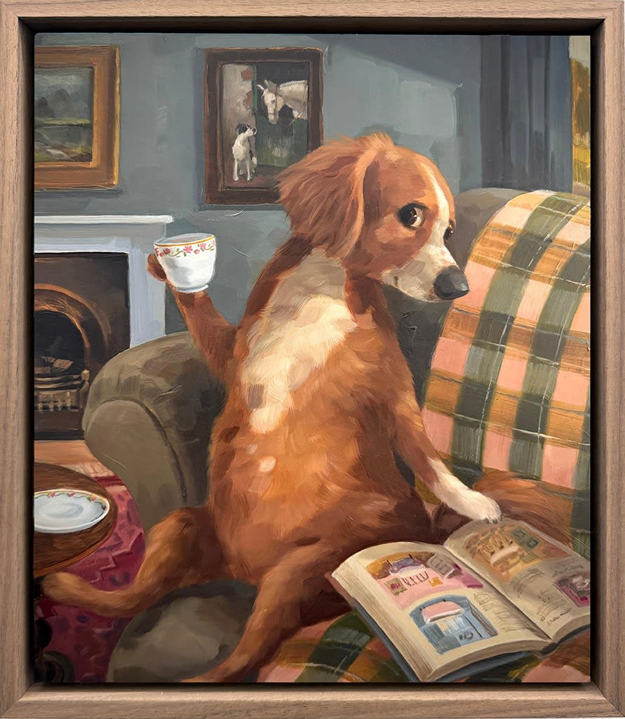 A painting of a dog sitting on a green couch holding a cup of tea and reading a book.