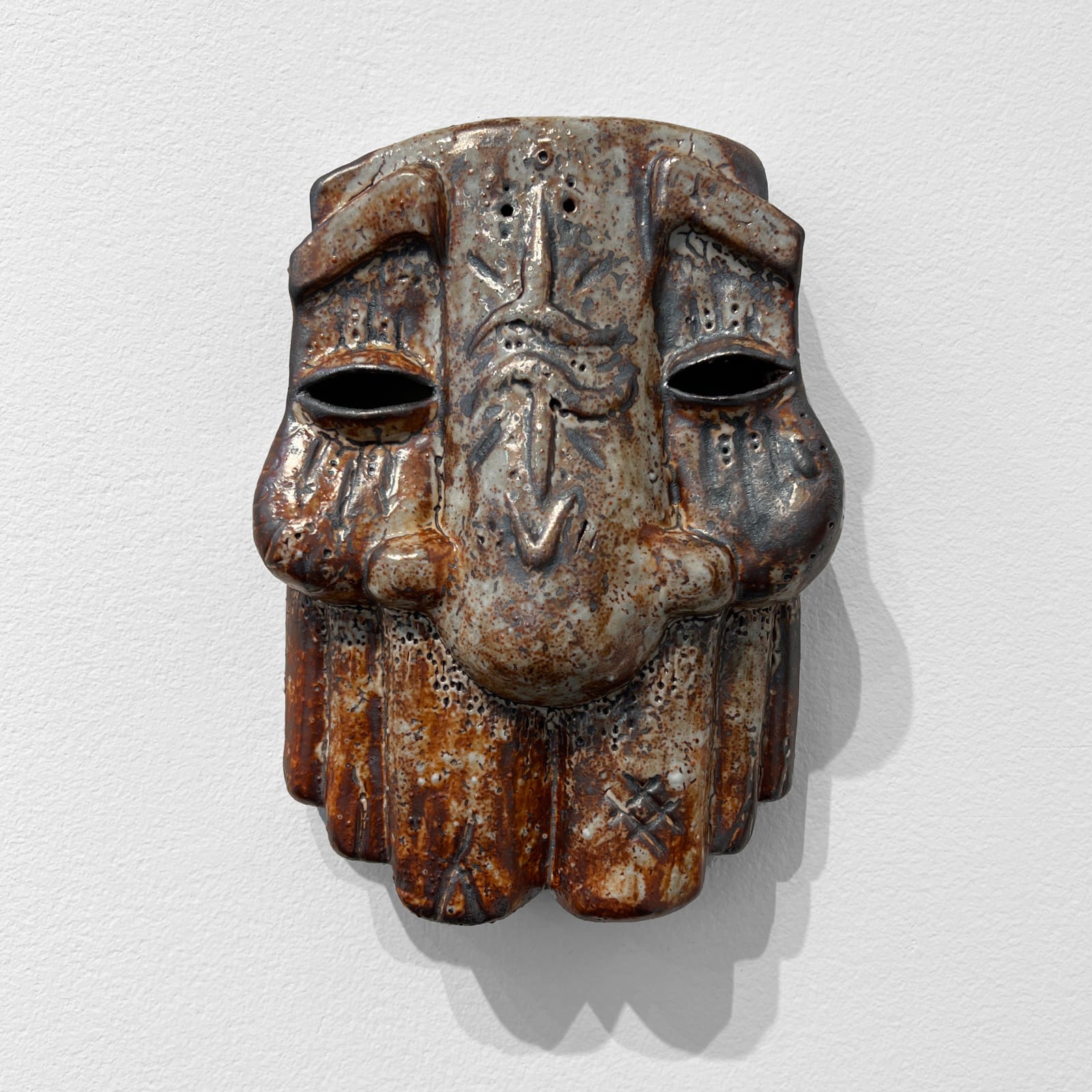ceramic mask by artist GATS