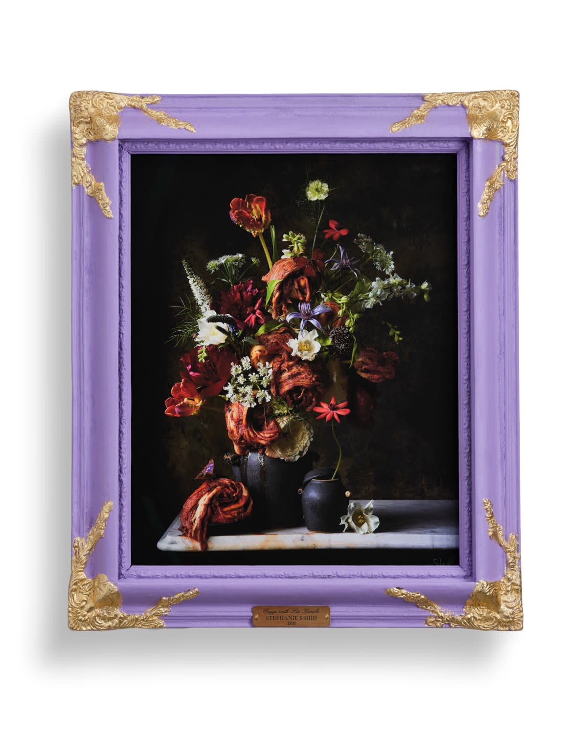 Stephanie Shih still life photograph of floral arrangement with kimchi against dark background, in custom purple frame with gold finishes