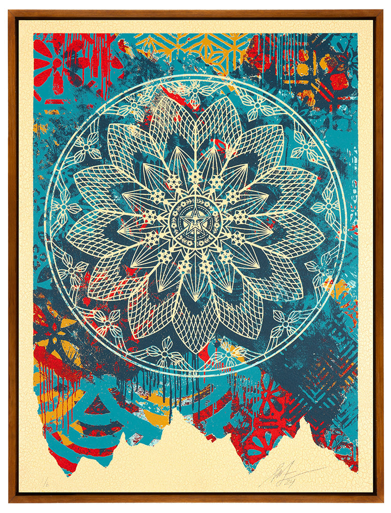 white mandala on a colorful patterned background