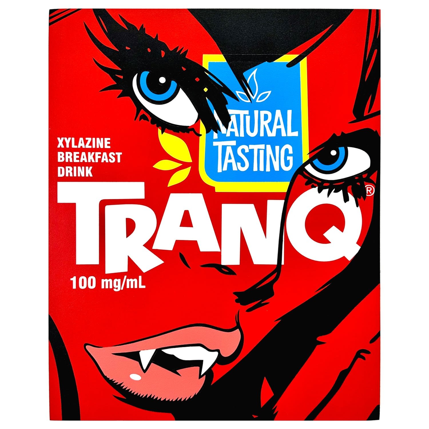 red face of a woman with fangs with white txt over her face reading 