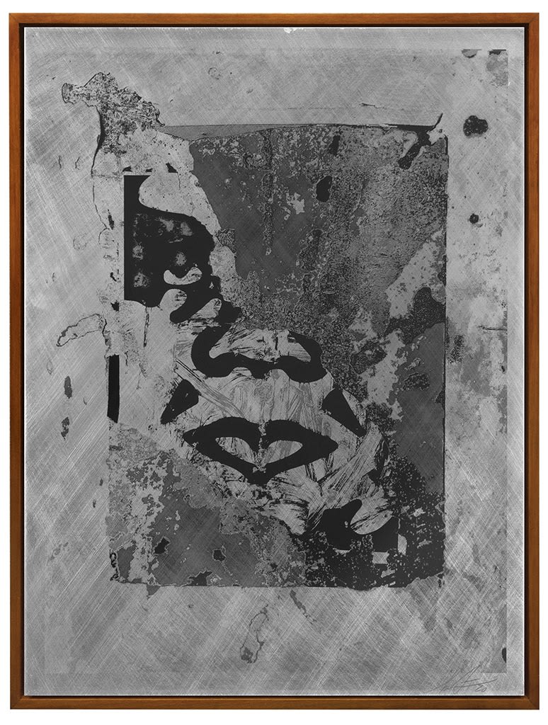 partial image of a grey scale face with smeared pattern abstracting parts of the face