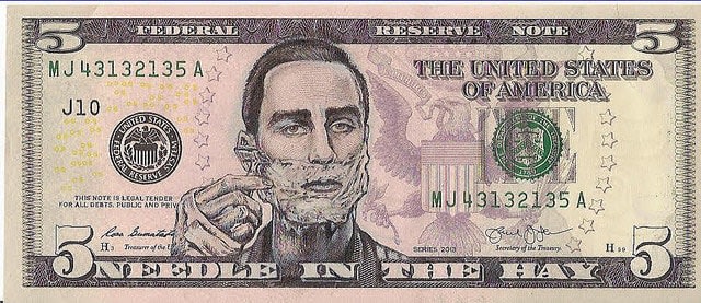 five dollar bill with the figure shaving their face