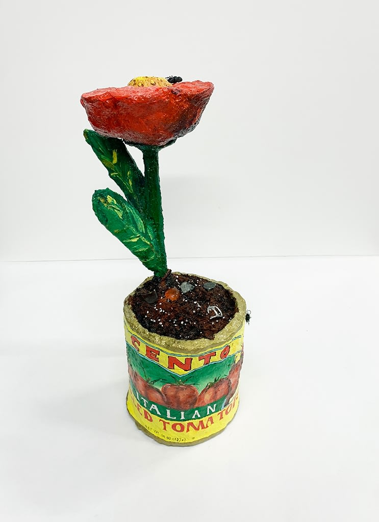 Nic Dyer mixed media sculpture of Cento tomato can with red flower planted inside
