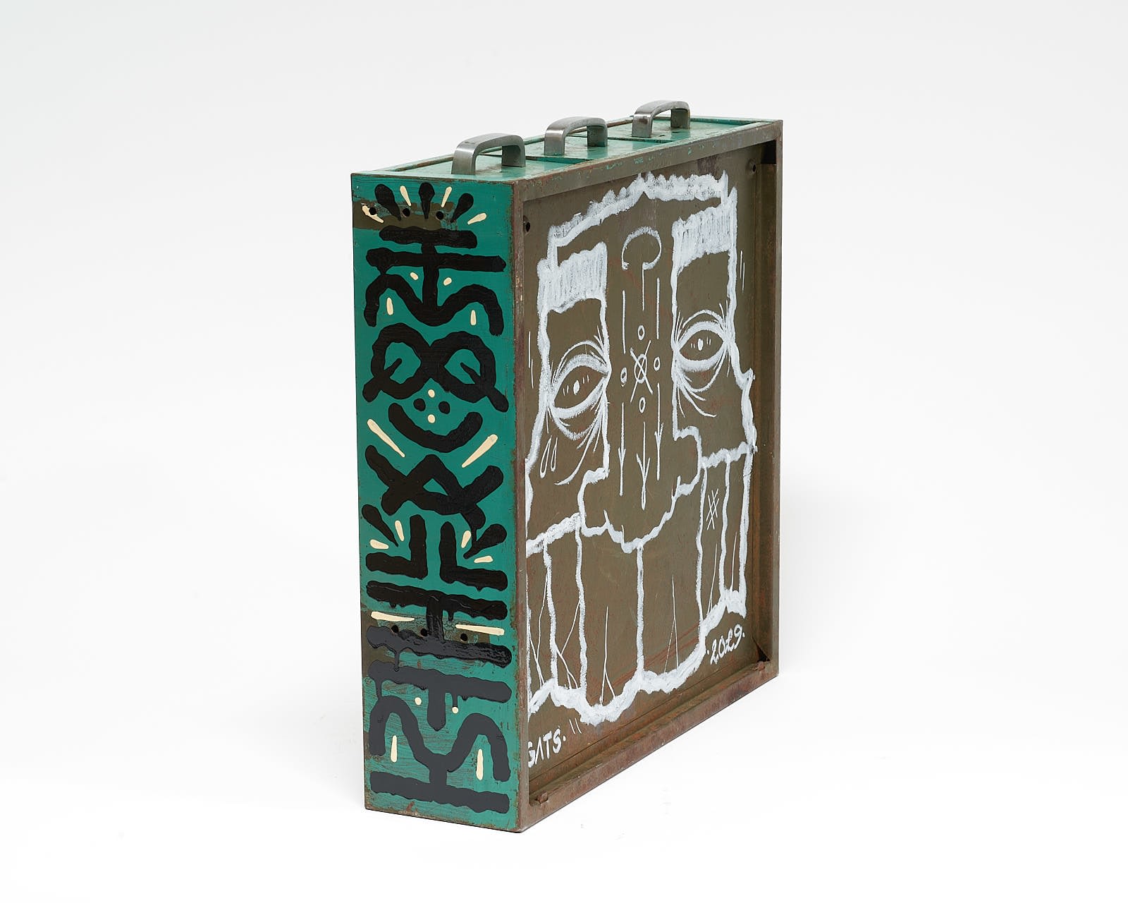 vintage filing cabinet adorned with designs of a geometric figured