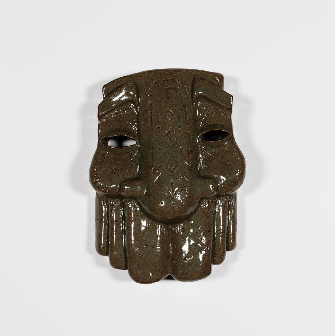 brown sculptural mask