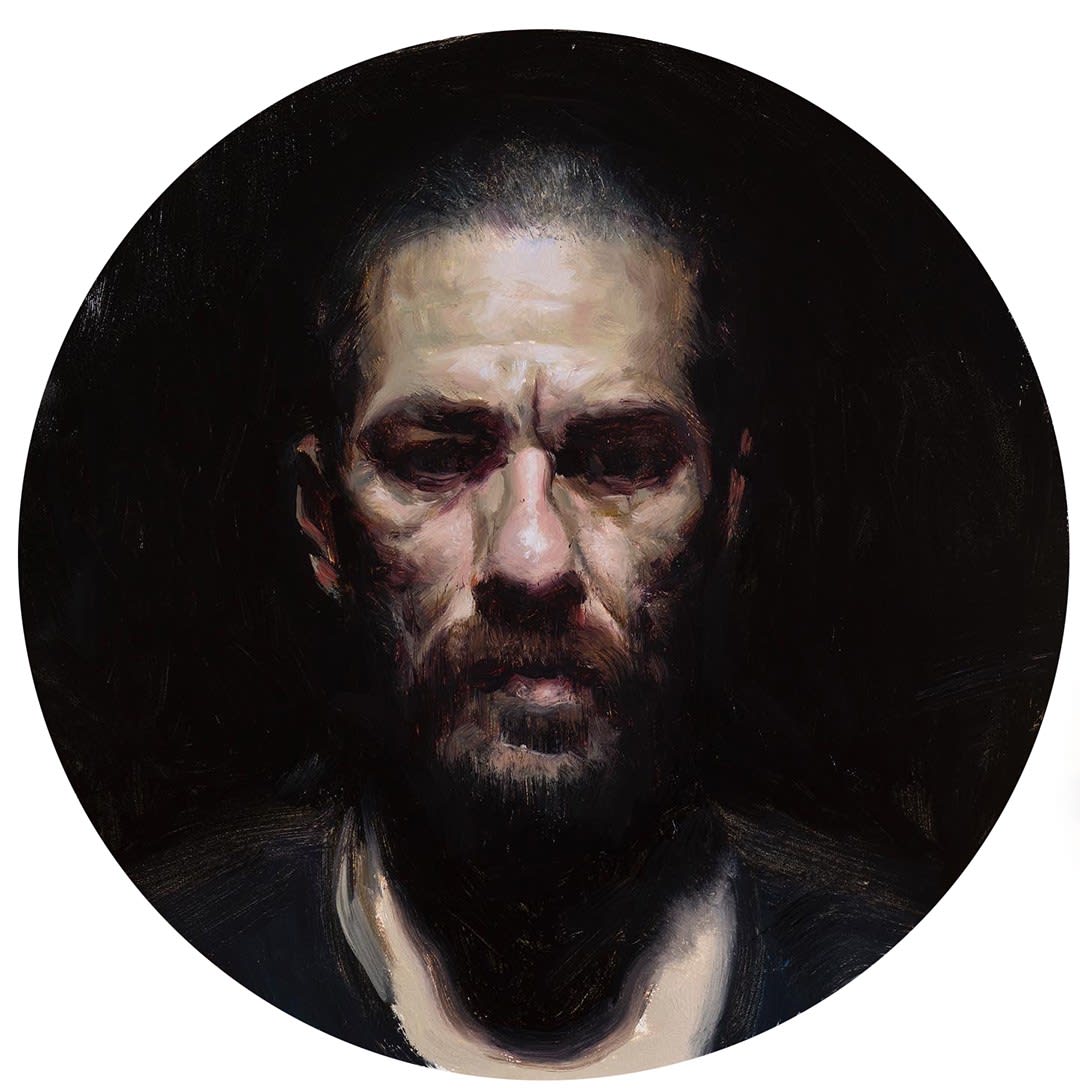 image of a middle aged man with a dark background