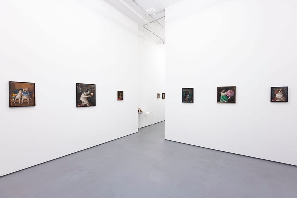Install photo of Alison Friend's paintings hanging on a white wall