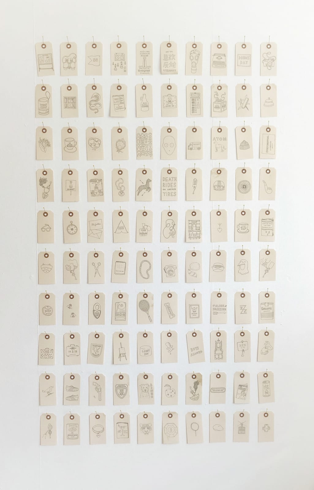 100 tags with drawings inspired by Wes Anderson films, by Esther Sarto