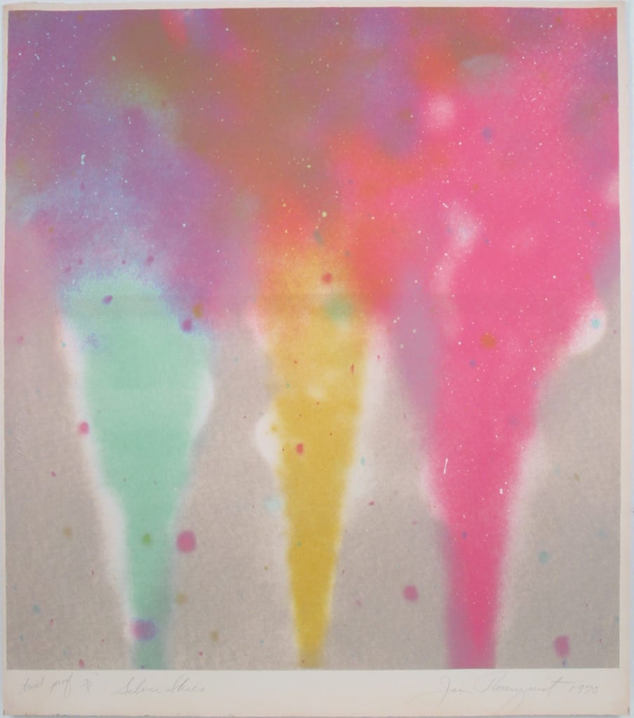 Three cones in a dusty color falling from the top. The cone to the left is light green. The middle cone is in yellow. The cone to the right is pink. At the top all the colors mix together in a cloud like mixture.