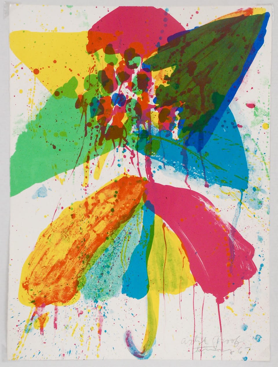An umbrella in all different bright colors with two tops.