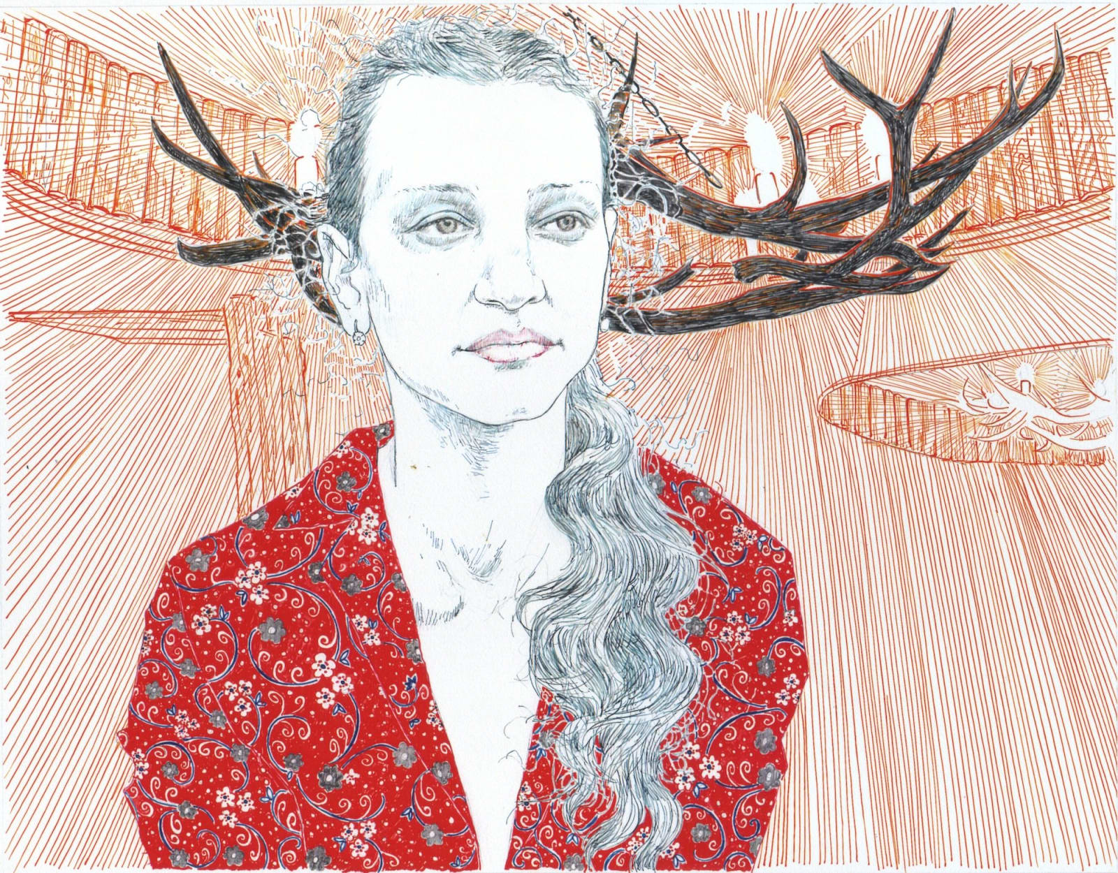 Woman in red floral top stands in a room decorated with antlers