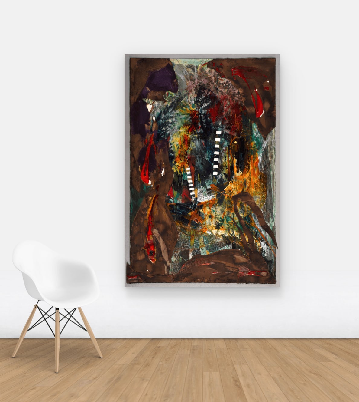 View on wall of an abstract painting with green, yellow, black and grey layered in the middle.