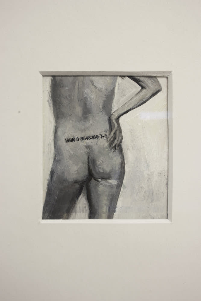 Photograph of artist back with ISBN number tattoo