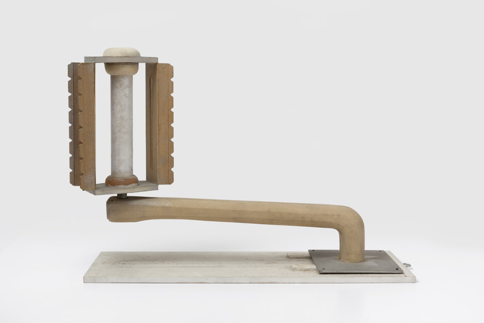 A wooden sculpture in the form of a bicycle crankshaft and pedal