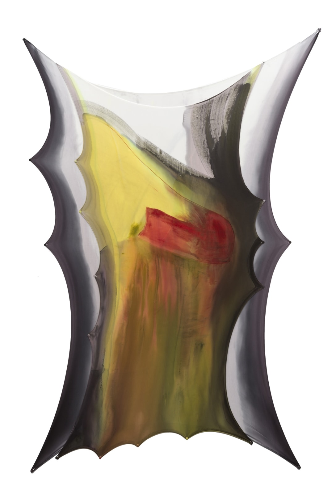 Thin stretched and pinned white fabric dyed with red, green, yellow, and black pours