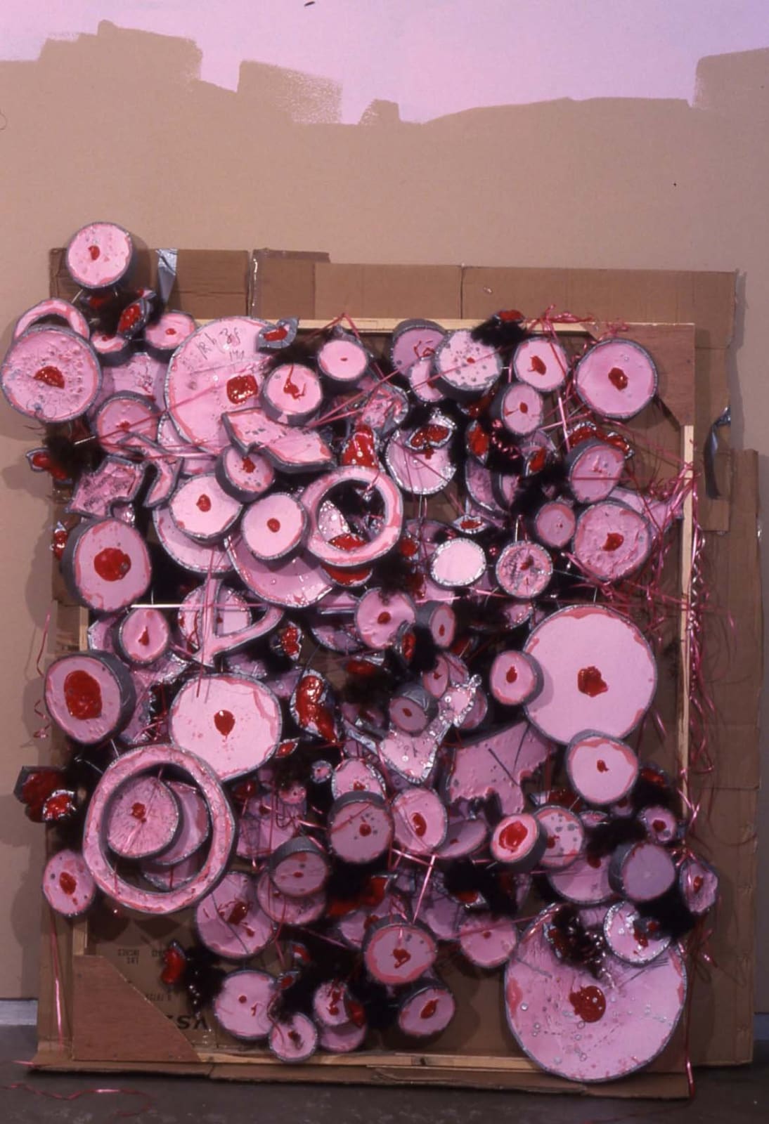 Many cardboard circles in a fungus-like formation