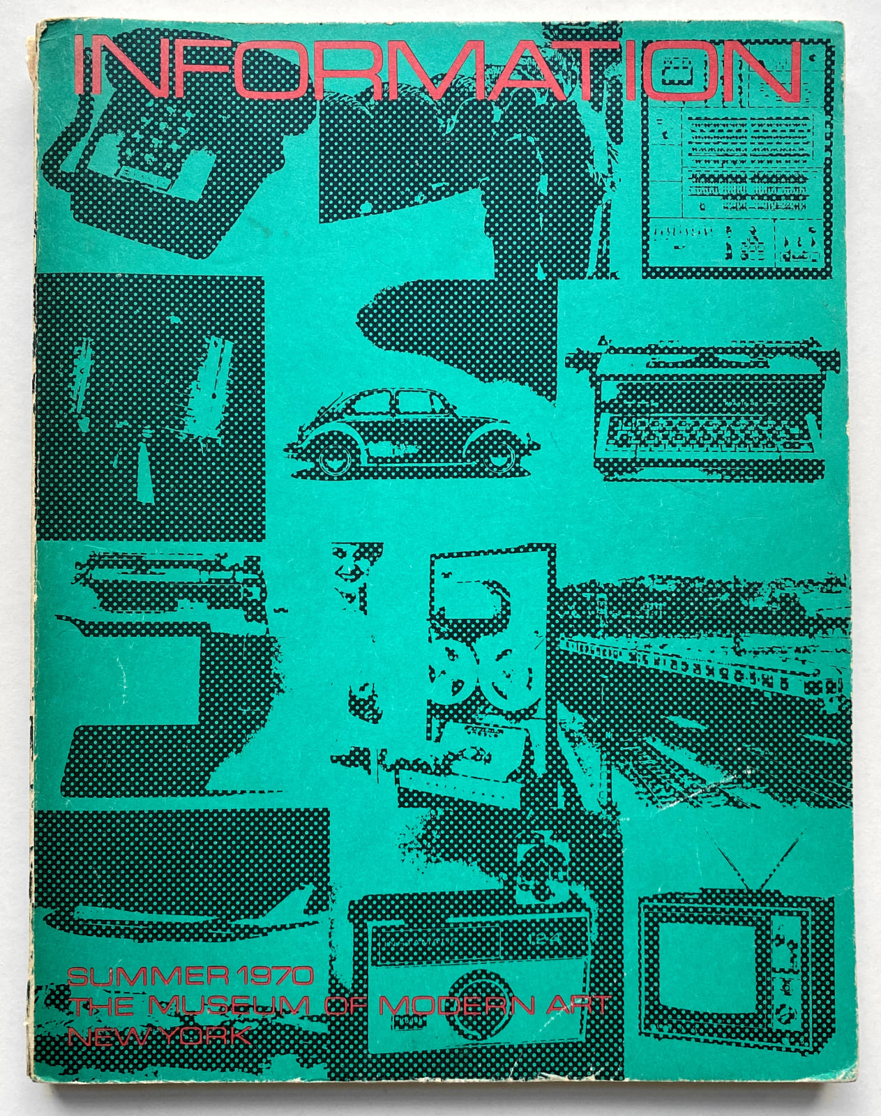 Green exhibition catalogue with the word information printed in red with images cars, radios, television, phones on the page
