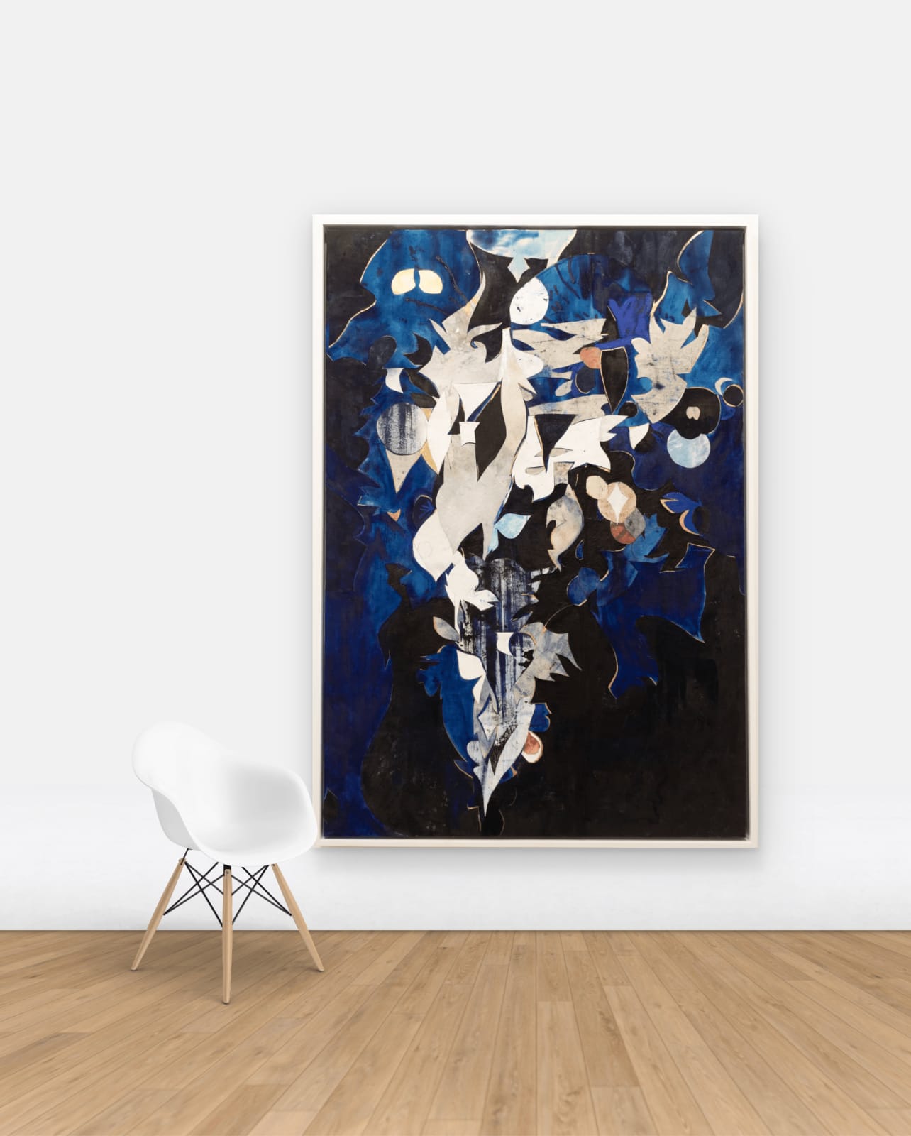 Abstract collage created from cut-up paintings and studio detritus hung on wall