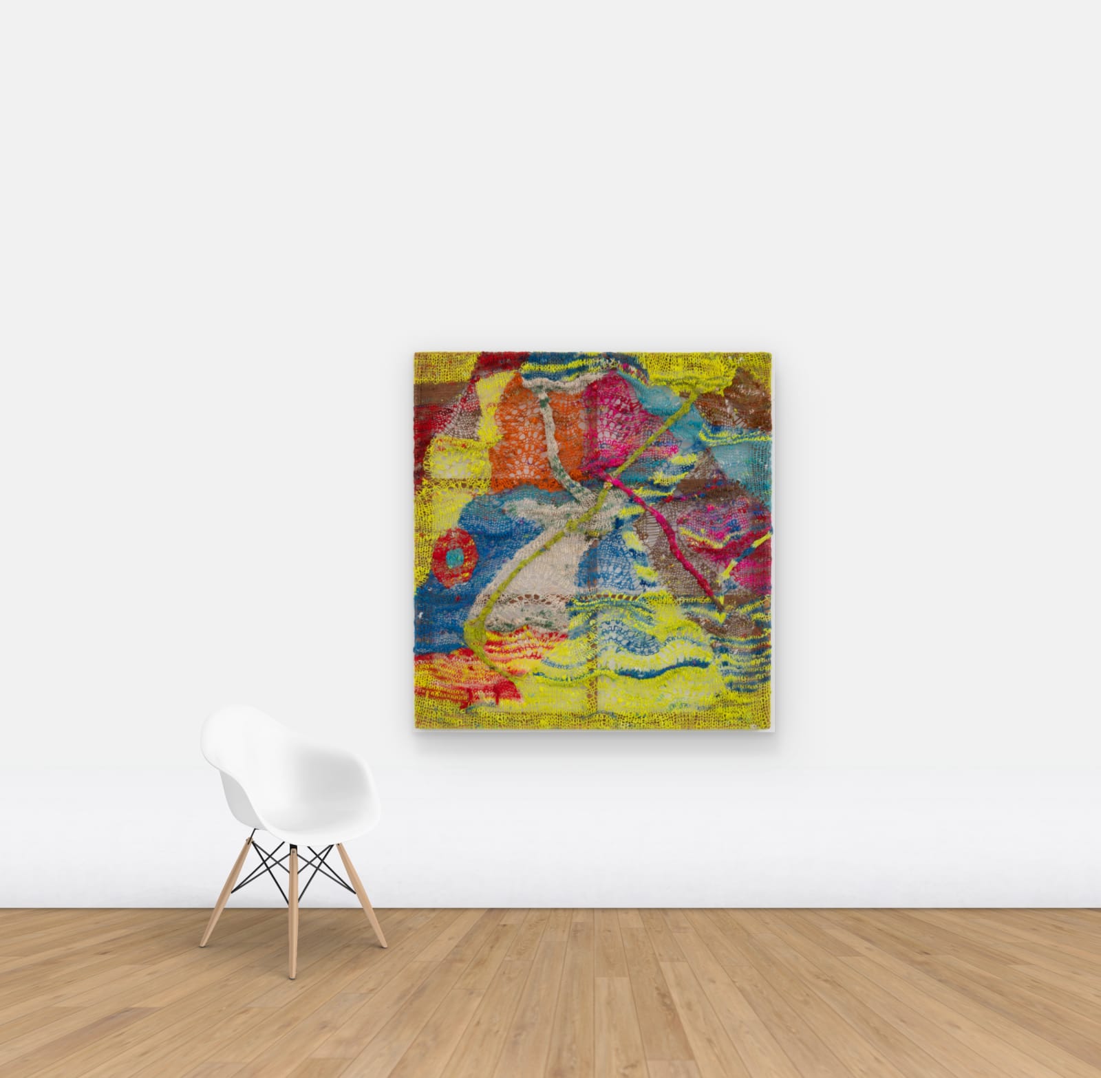 An organic composition in multi-colored fibers stretched across a redwood frame as one would stretch a painting. The fibers are knit at varying thicknesses so that in places one can see through the stitches to the wall behind installed on wall