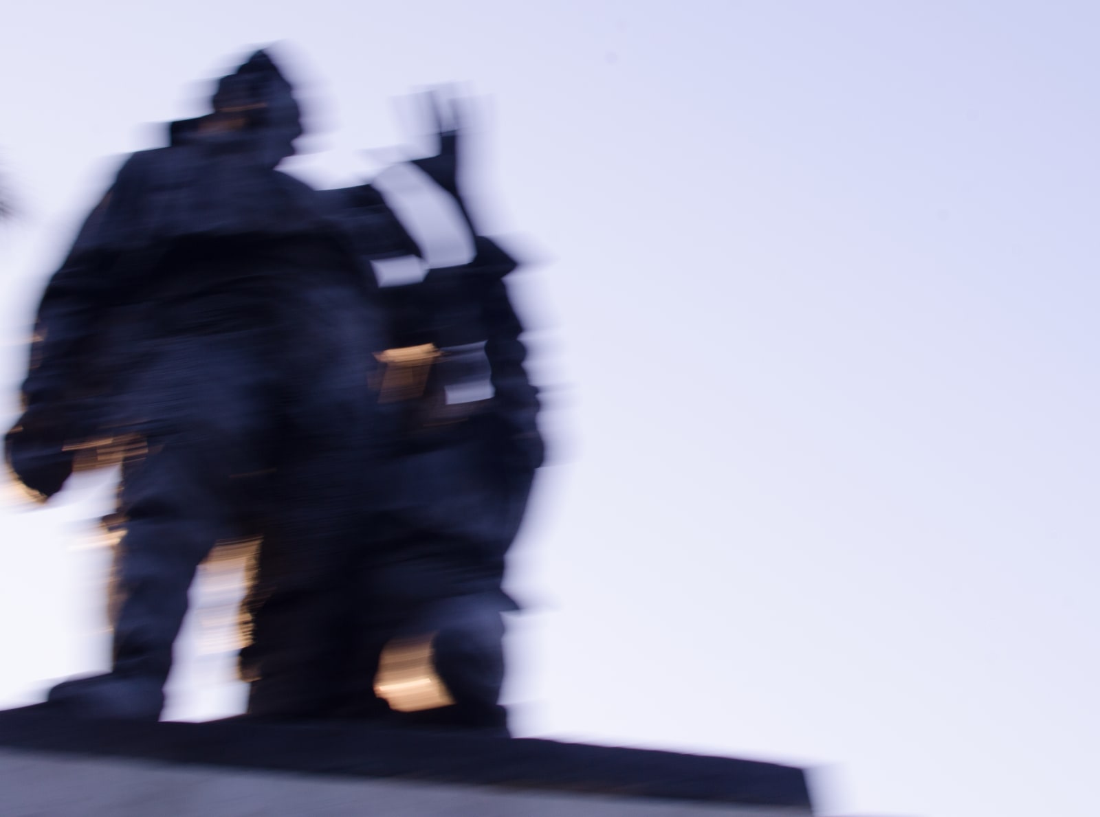 Blurred photograph of two people