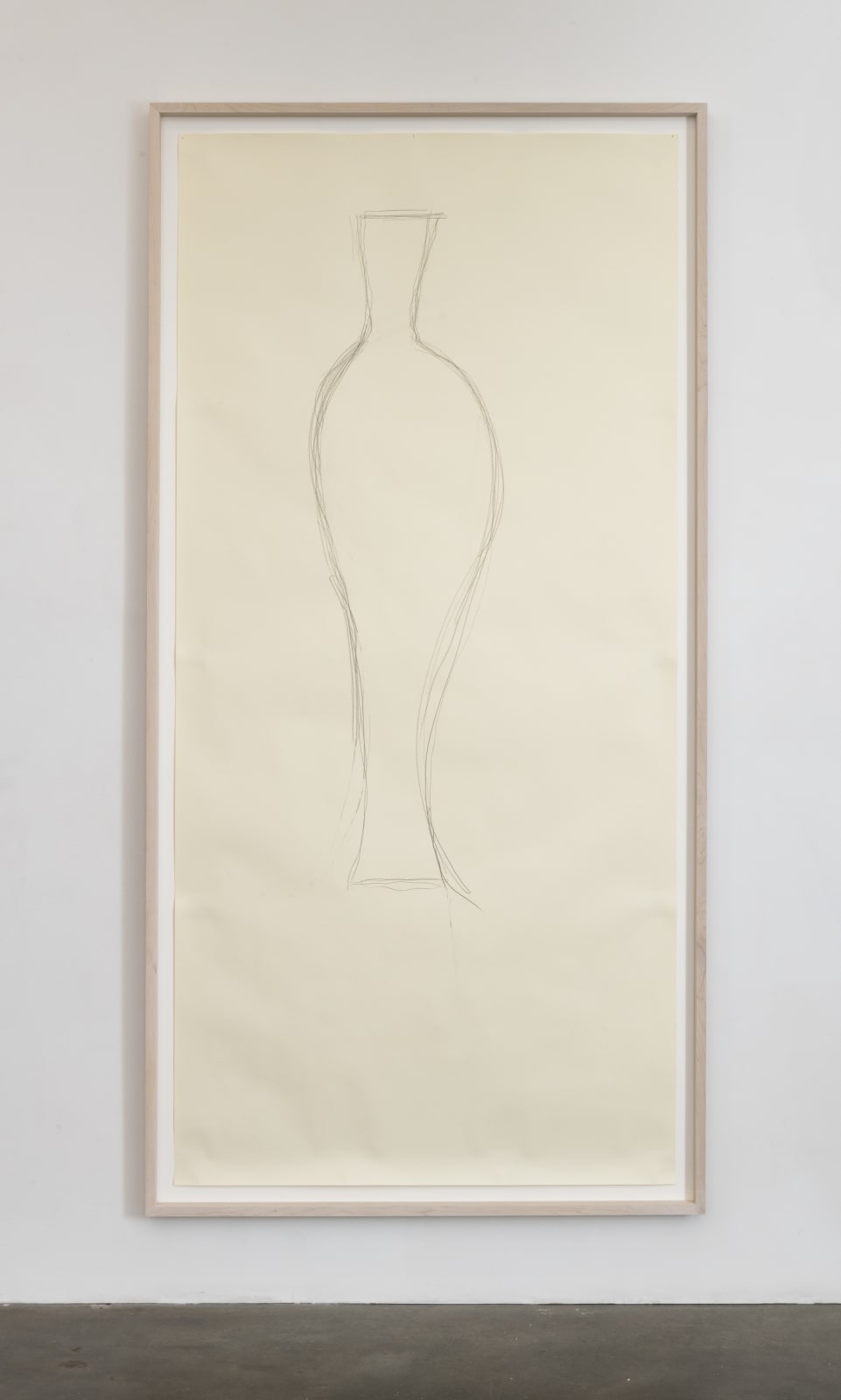 A delicate line drawing in the shape of an amphore vessel on light beige colored pape