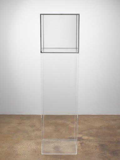 Glass cube on pedestal
