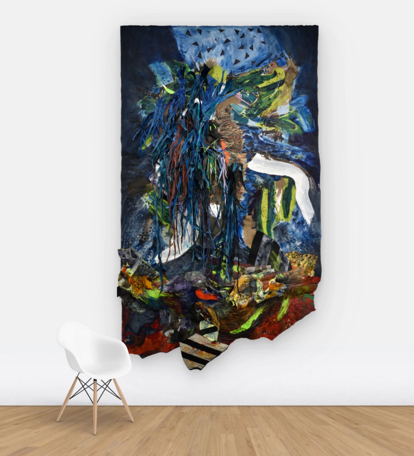 View on wall of blue irregular shaped abstract painting