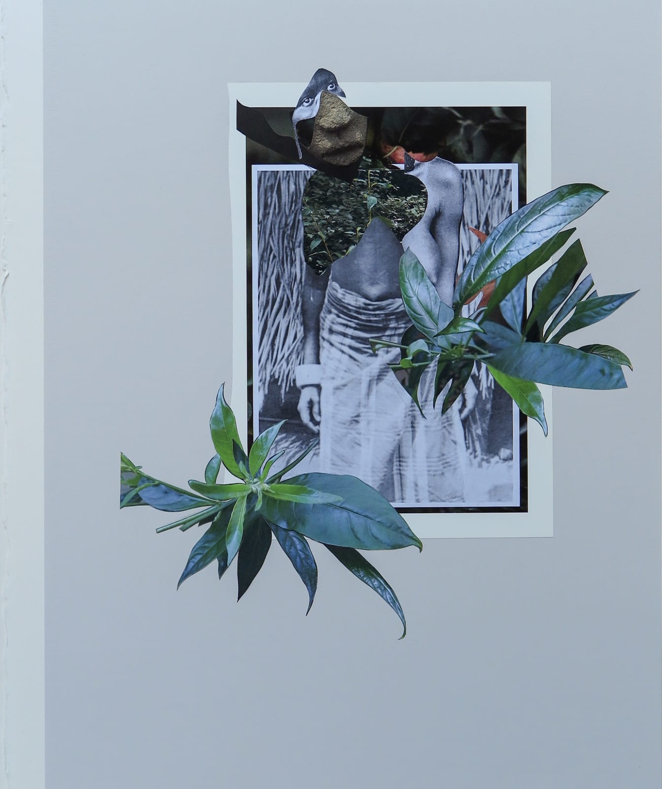 Framed collage featuring images from anthropological magazines, art publications, and colonial era photographs