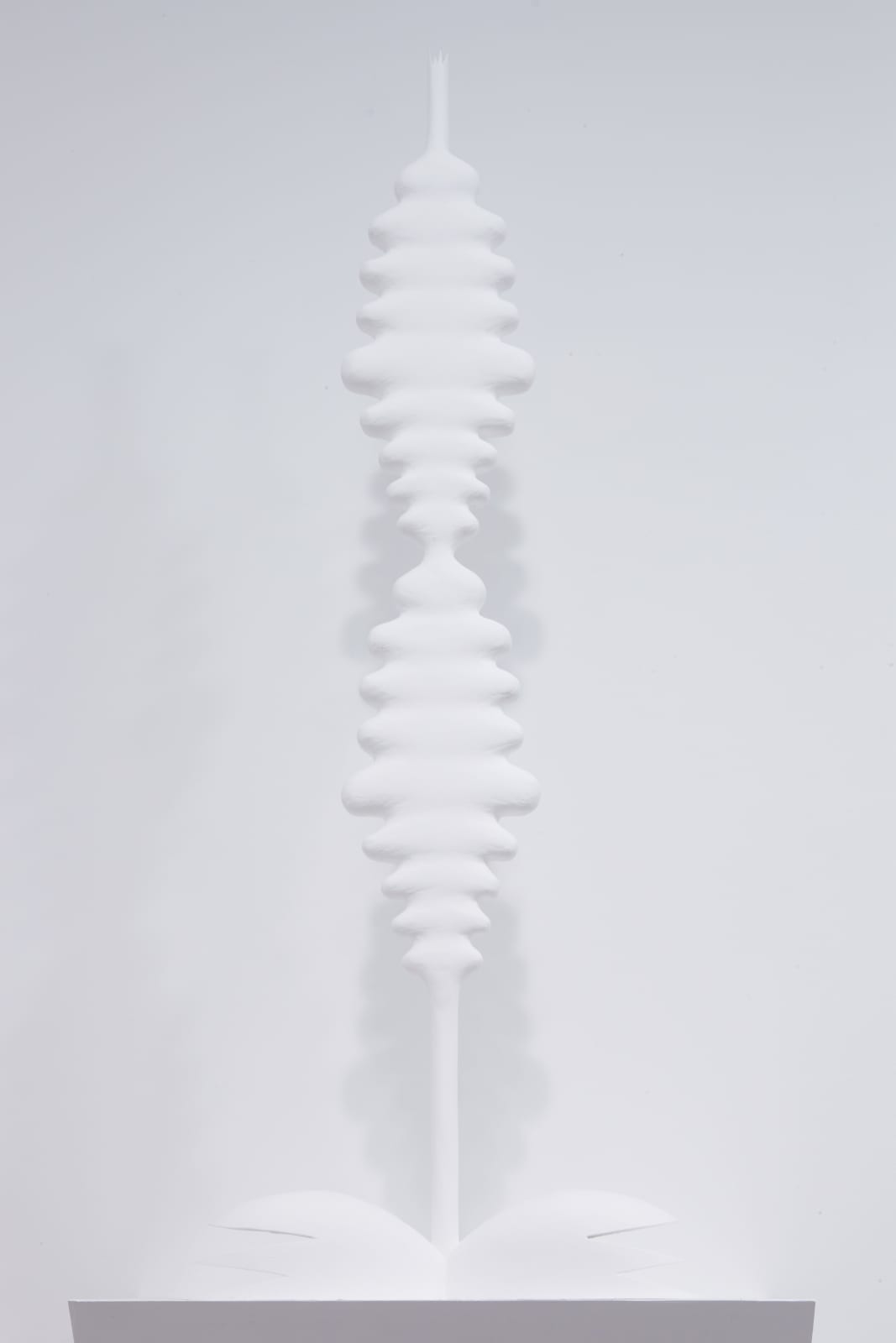 Abstract white sculpture created from ash and vinyl acrylic