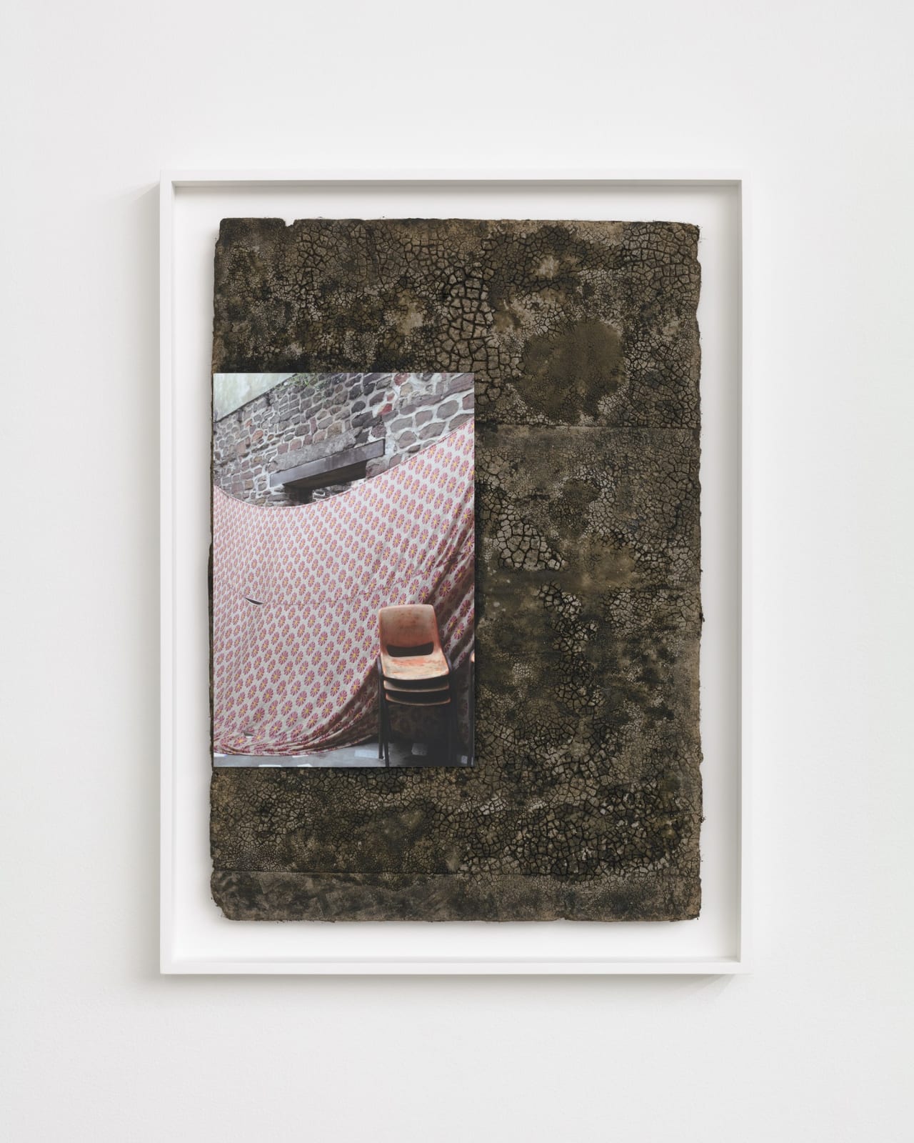 Karyn Olivier's Welcome (Accra), a framed sculptural artwork with a photographic print and roofing layered on top against a white wall