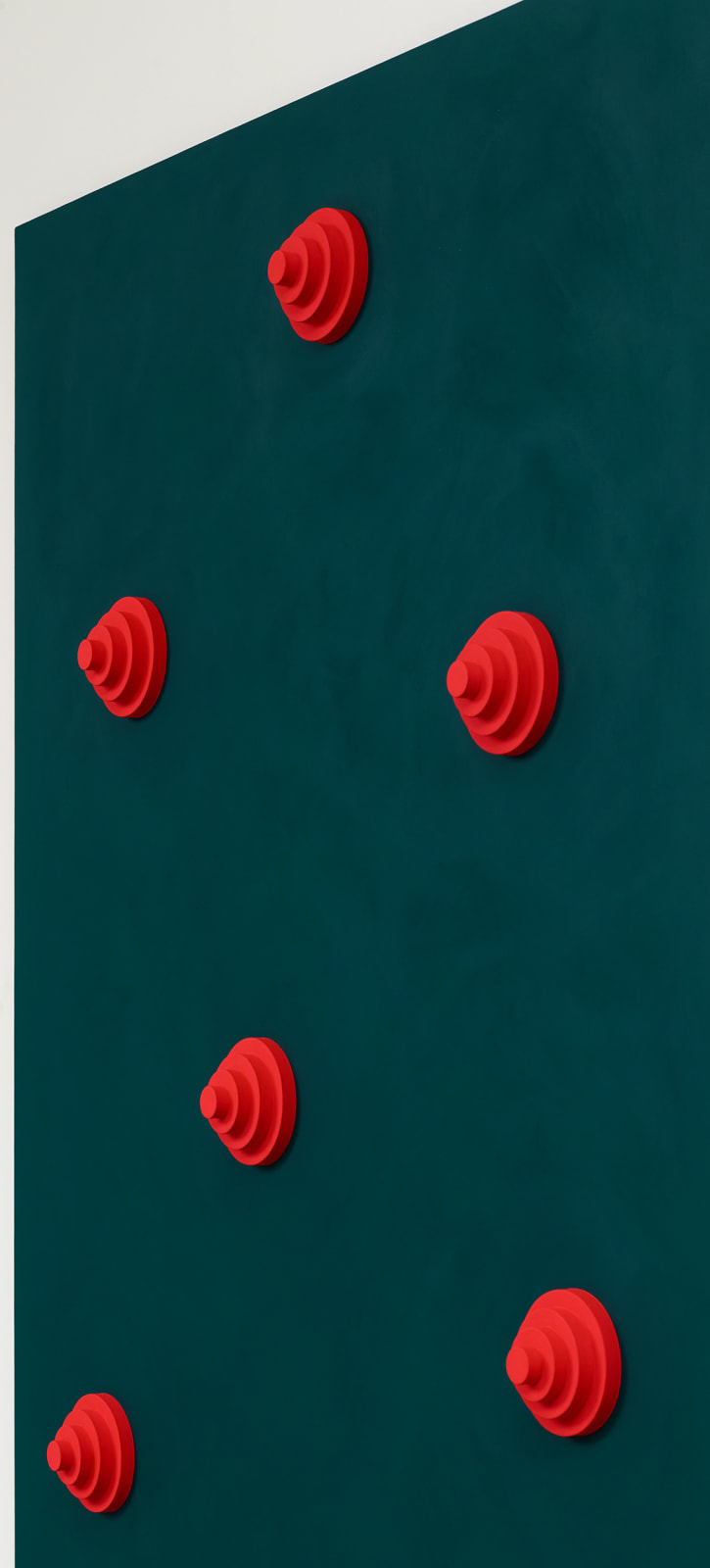 Green board with red circular objects