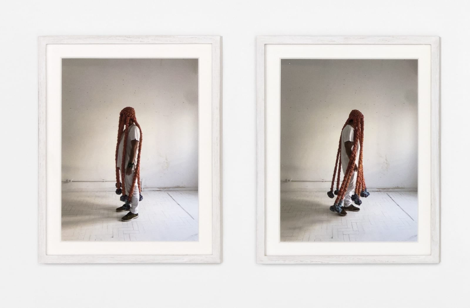 Photo series of Neto wearing sculpture