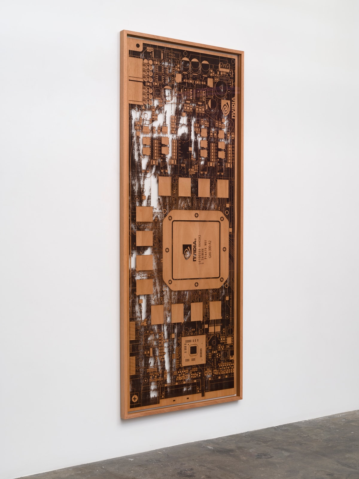 a laser sculpted wood sculpture on a white wall