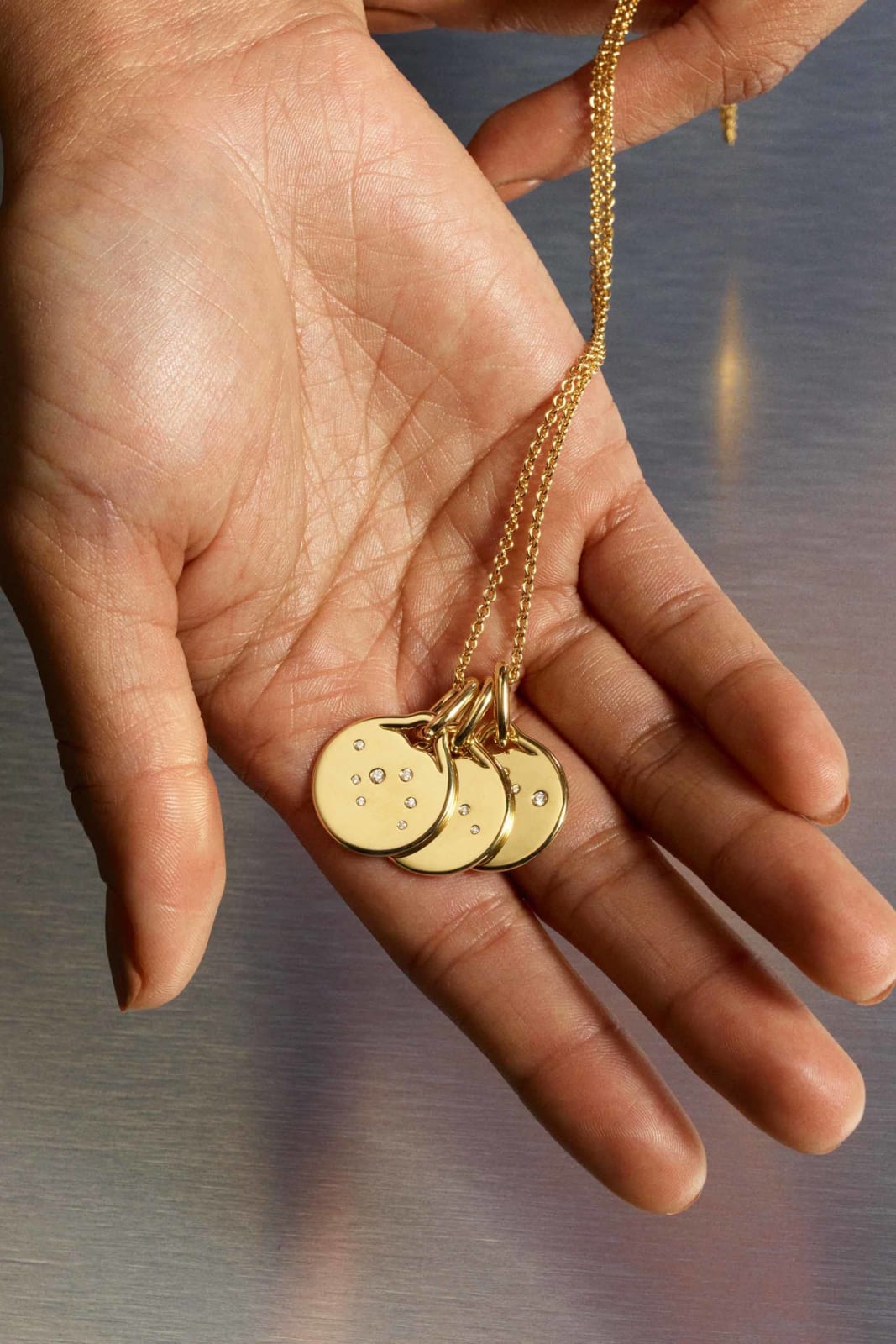 Fernando Jorge, Sagittarius gold pendant