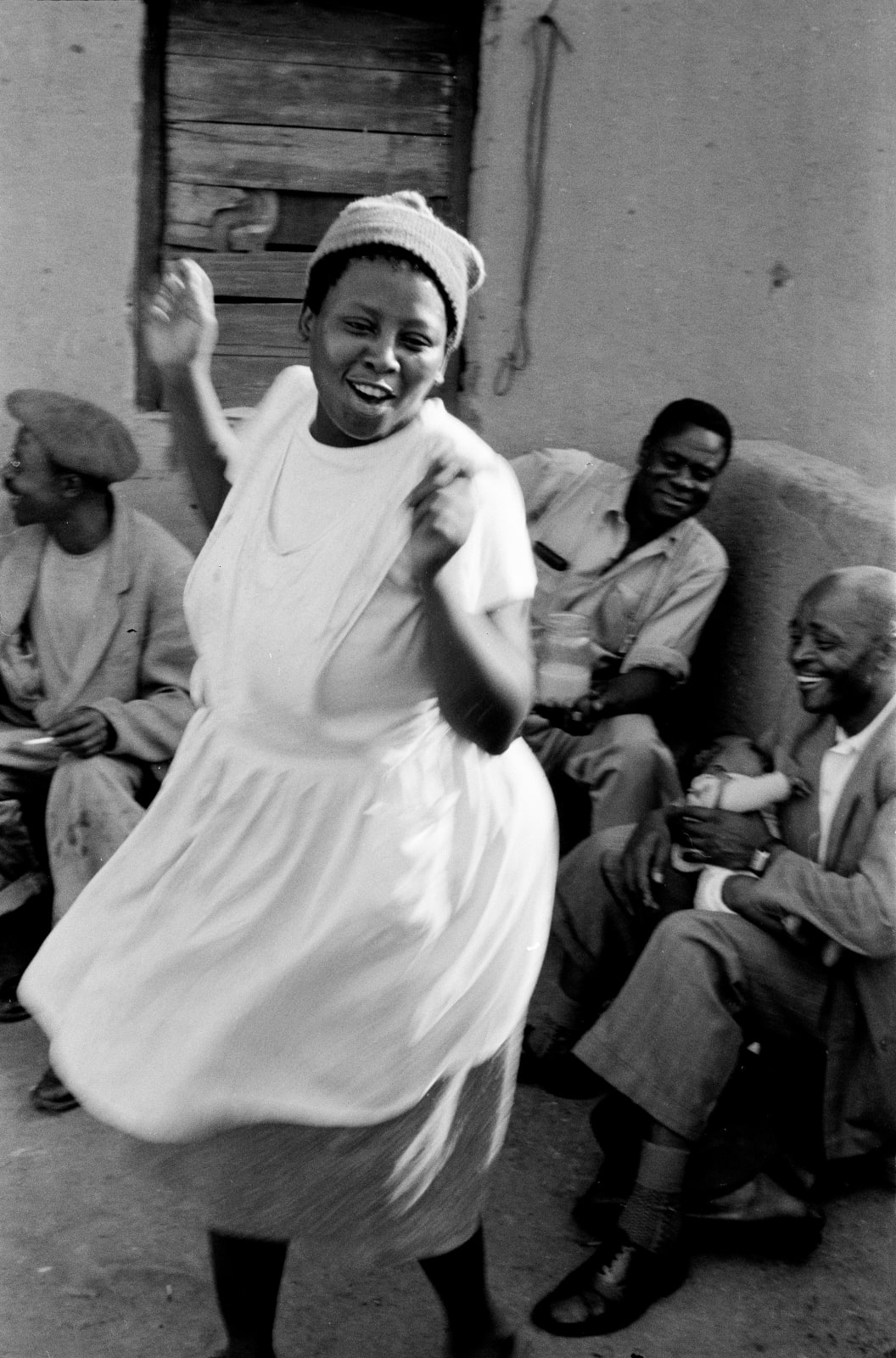 Ernest Cole, Woman dancing. The atmosphere of Shebeens is free, in contrast to that of regimented halls , circa 1965