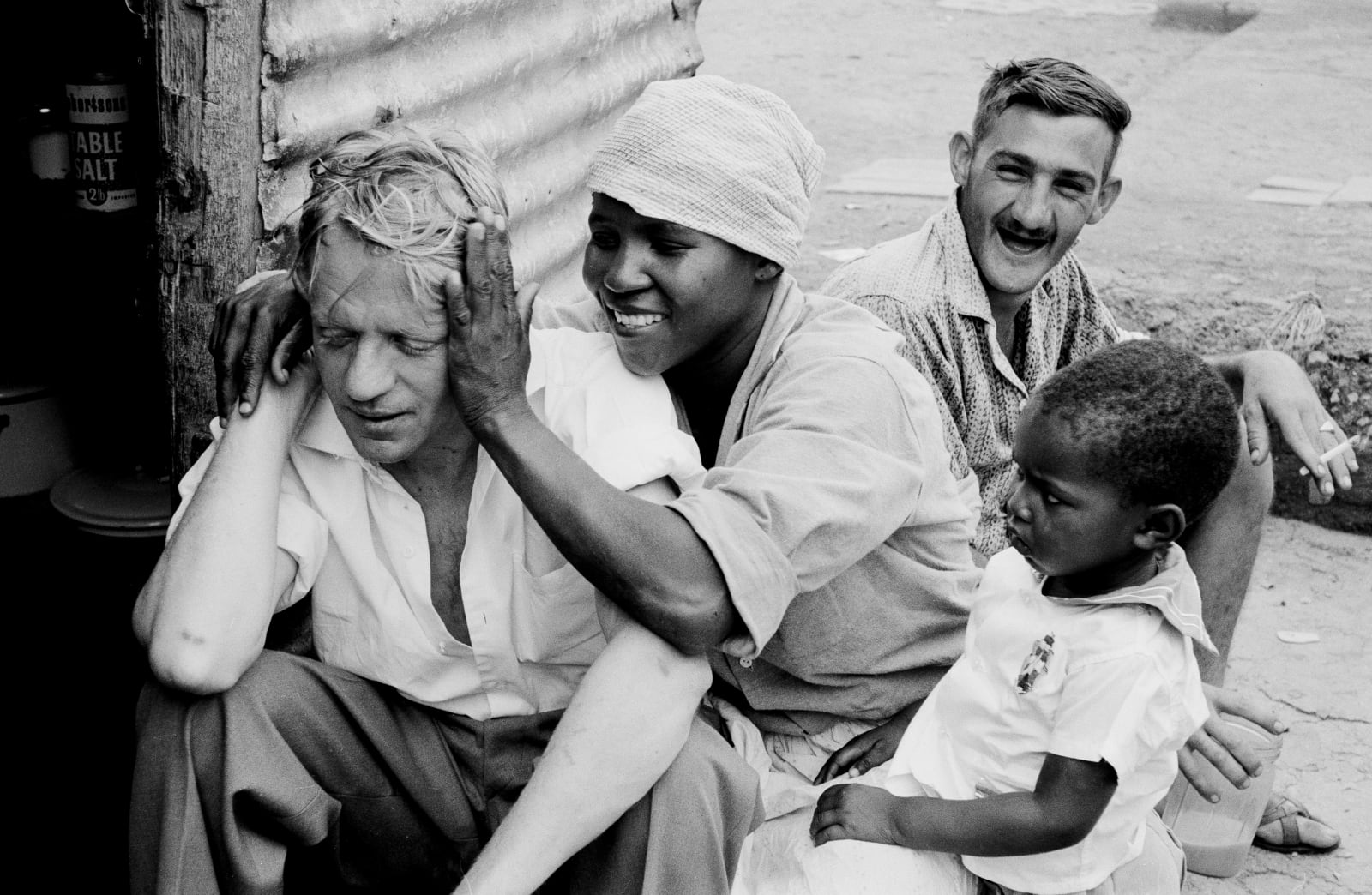 Ernest Cole, Shebeen with white and black patrons, circa 1965