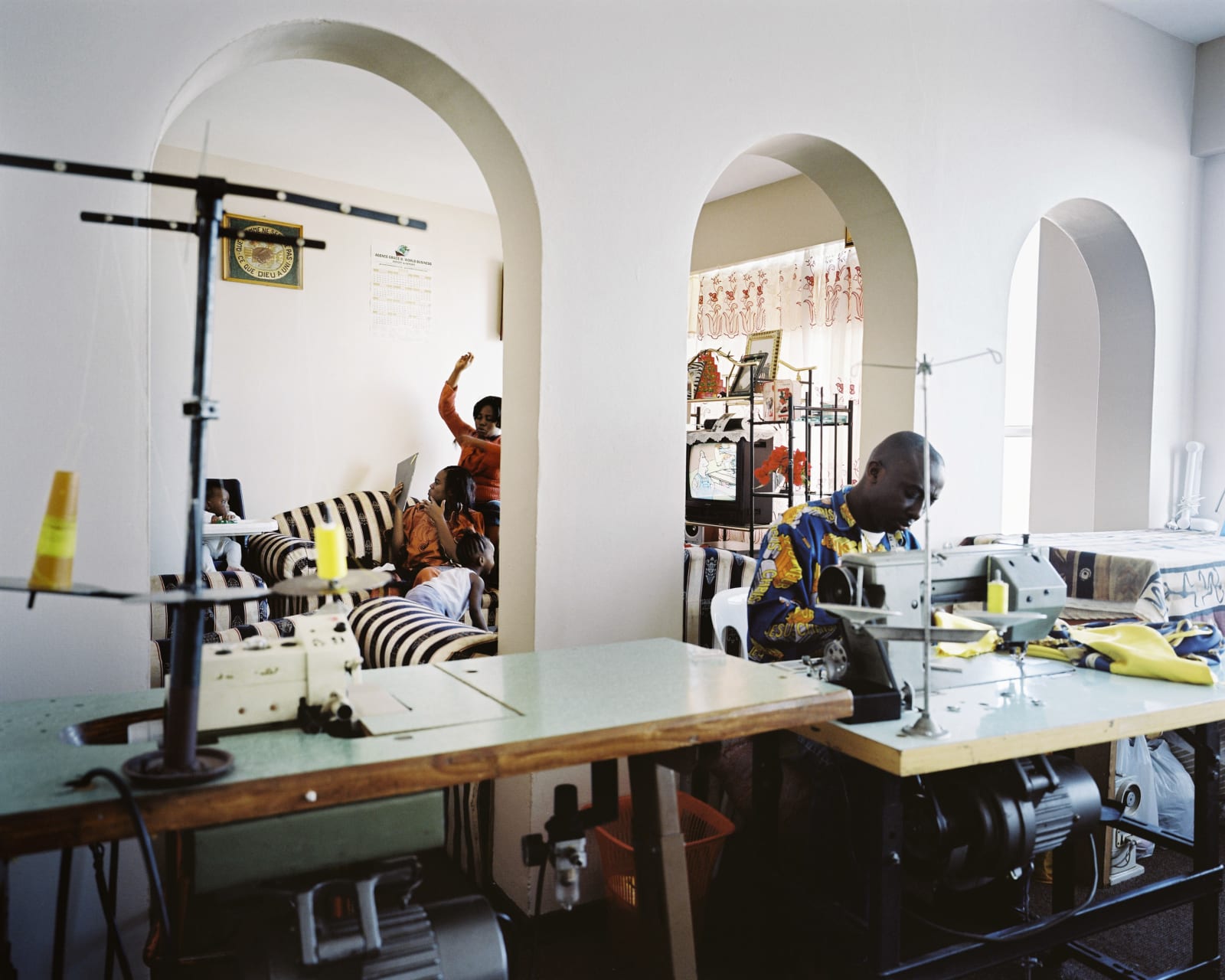 Patrick Waterhouse, Patrick Waterhouse & Mikhael Subotzky: Bapi working, Ponte City, Johannesburg, 2009