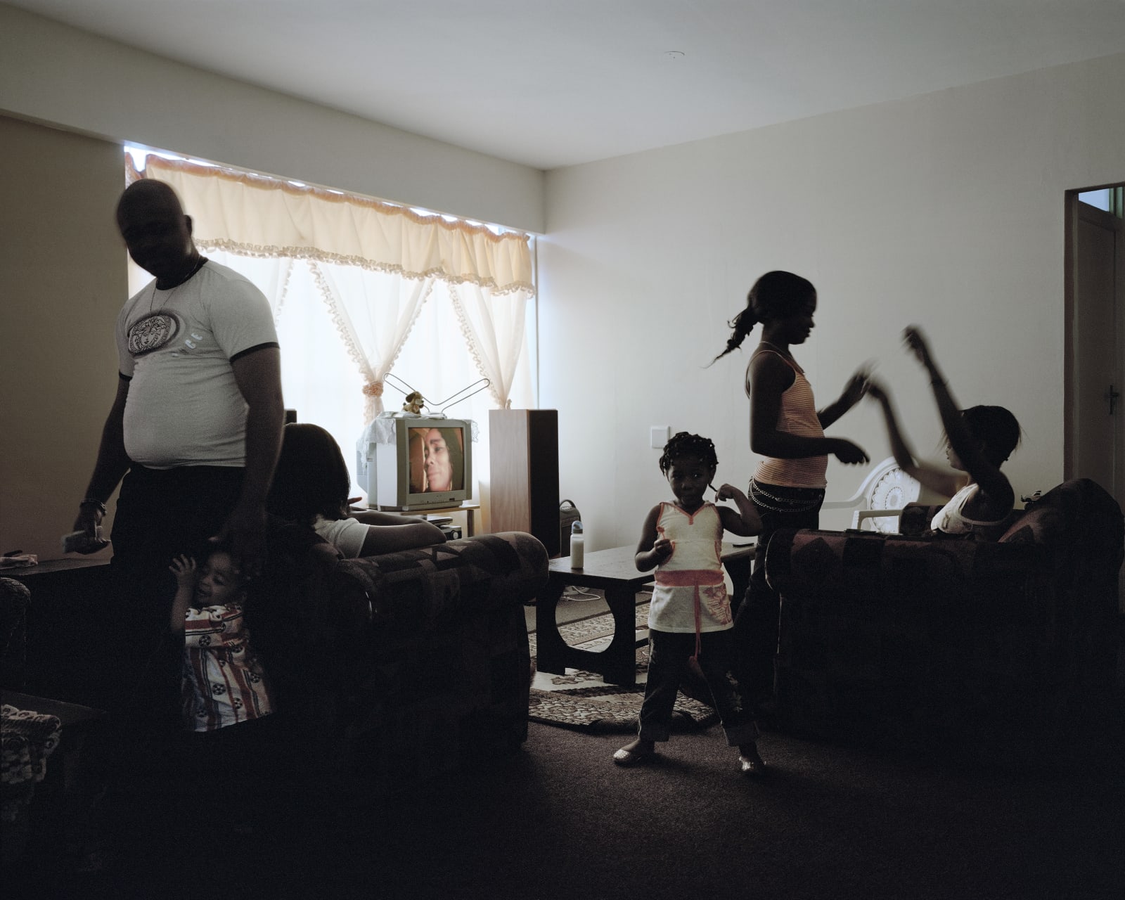 Patrick Waterhouse, Patrick Waterhouse & Mikhael Subotzky: Moses and Family, Ponte City, Johannesburg, 2009