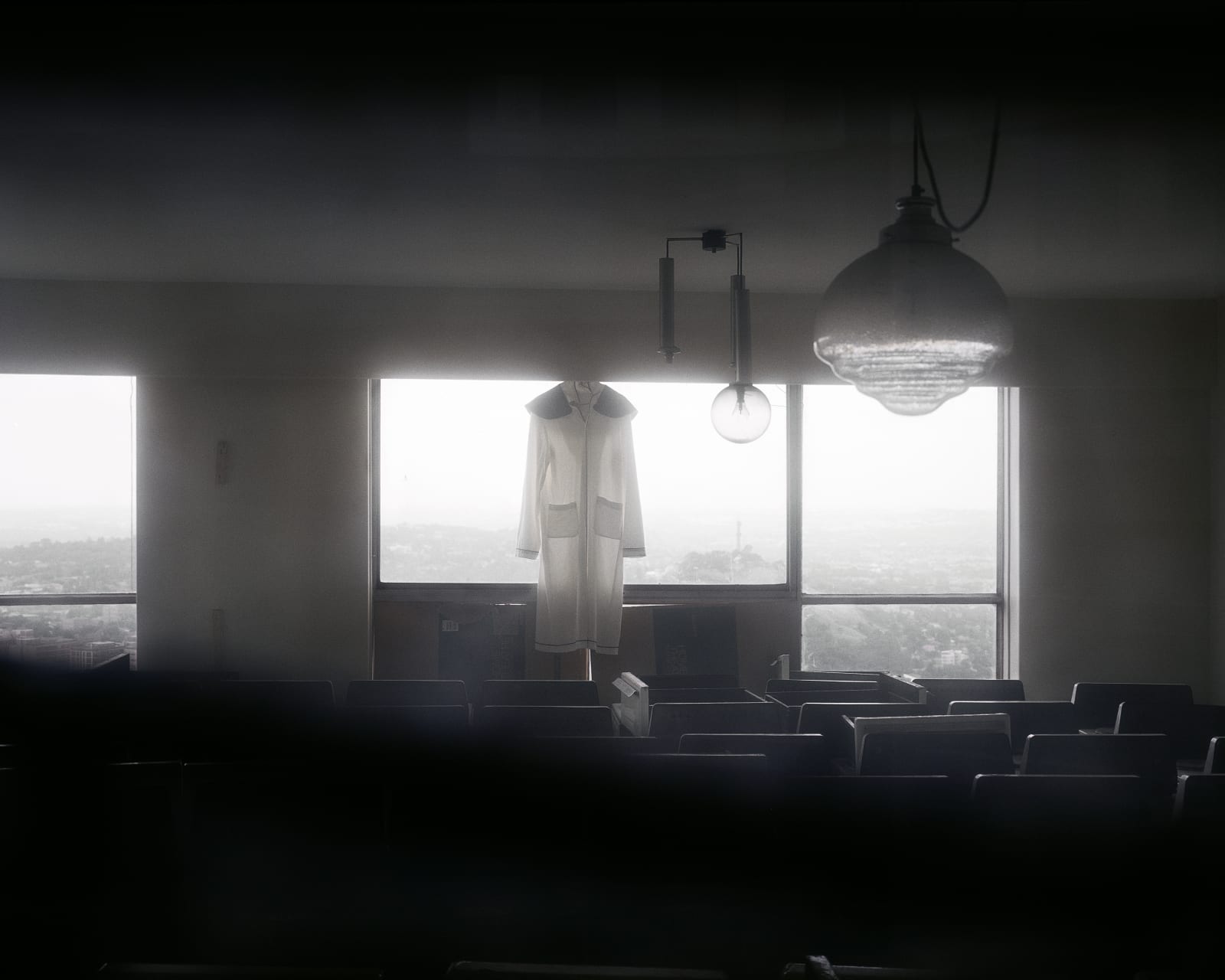Patrick Waterhouse, Patrick Waterhouse & Mikhael Subotzky: Church Uniform and Stored Stoves, Ponte City, 2008