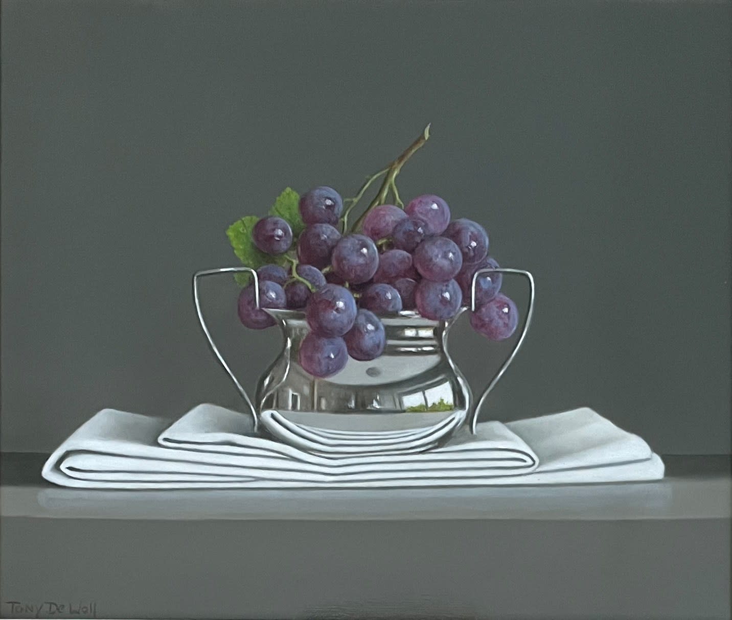 Tony de Wolf, Grapes in Silver on Folded Linen