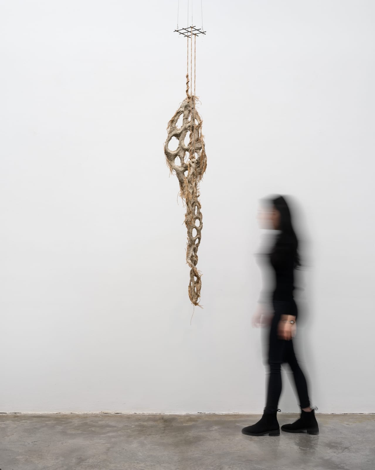 Mire Lee, Untitled (hanging burlap piece with many holes), 2022–2023
