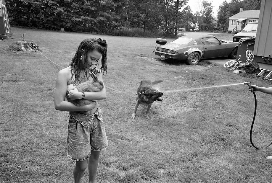 Sage Sohier, Girl with rabbit and German Shepherd, Laconia, New Hampshire, 1992